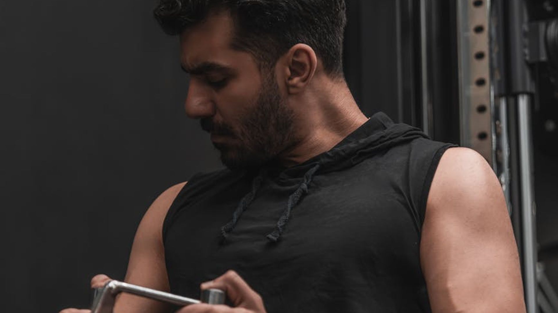 Athletic man focus on training in dark environment